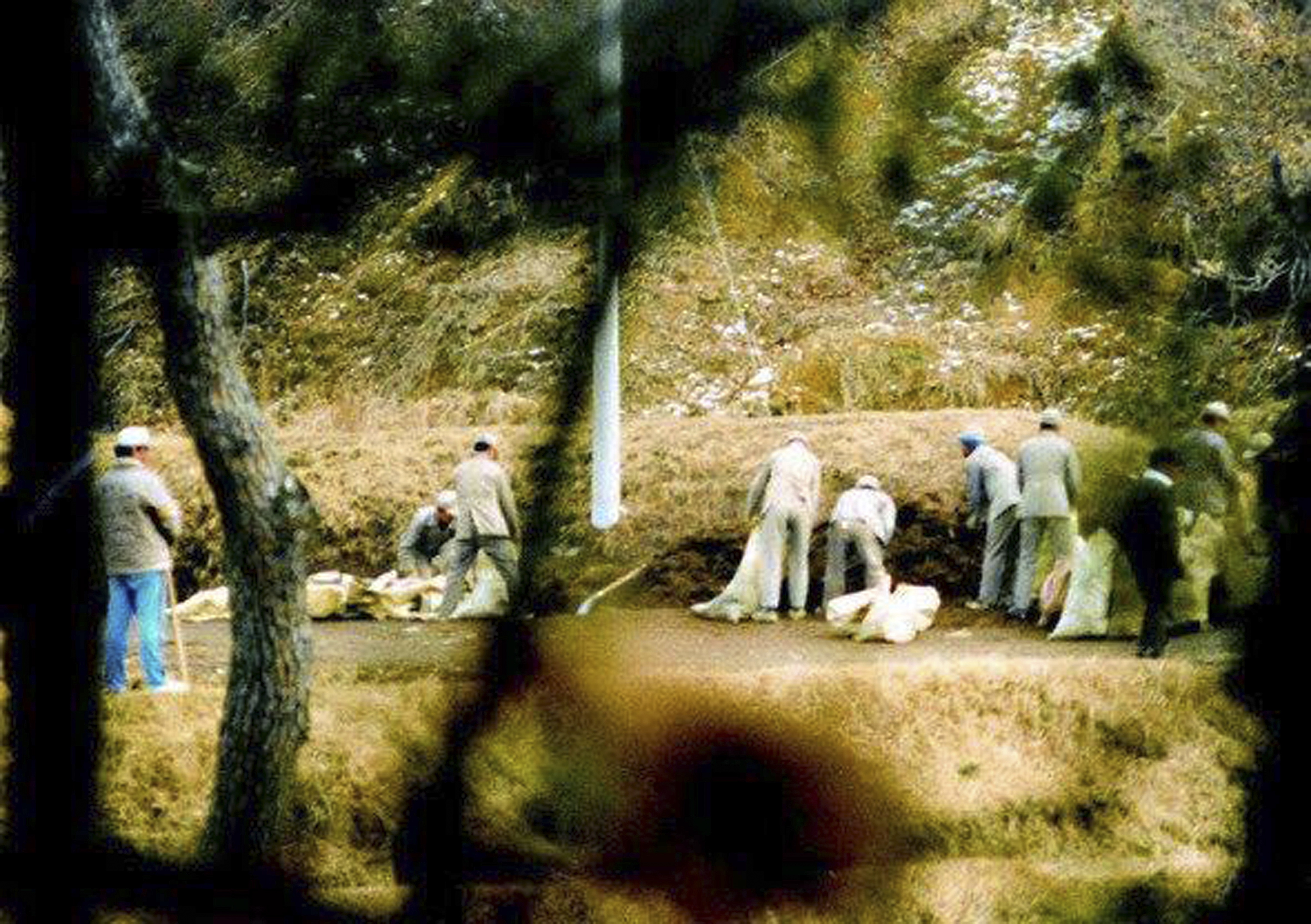 In this December 1986, photo provided by the Ulsan District Prosector's Office, Brothers Home inmates work at a construction site in Ulsan, South Korea. An Associated Press investigation found that rapes and killings of children and the disabled three decades ago at a South Korean institution for so-called vagrants, the Brothers Home, were much more vicious and widespread than previously realized. (Ulsan District Prosecutors' Office via AP)