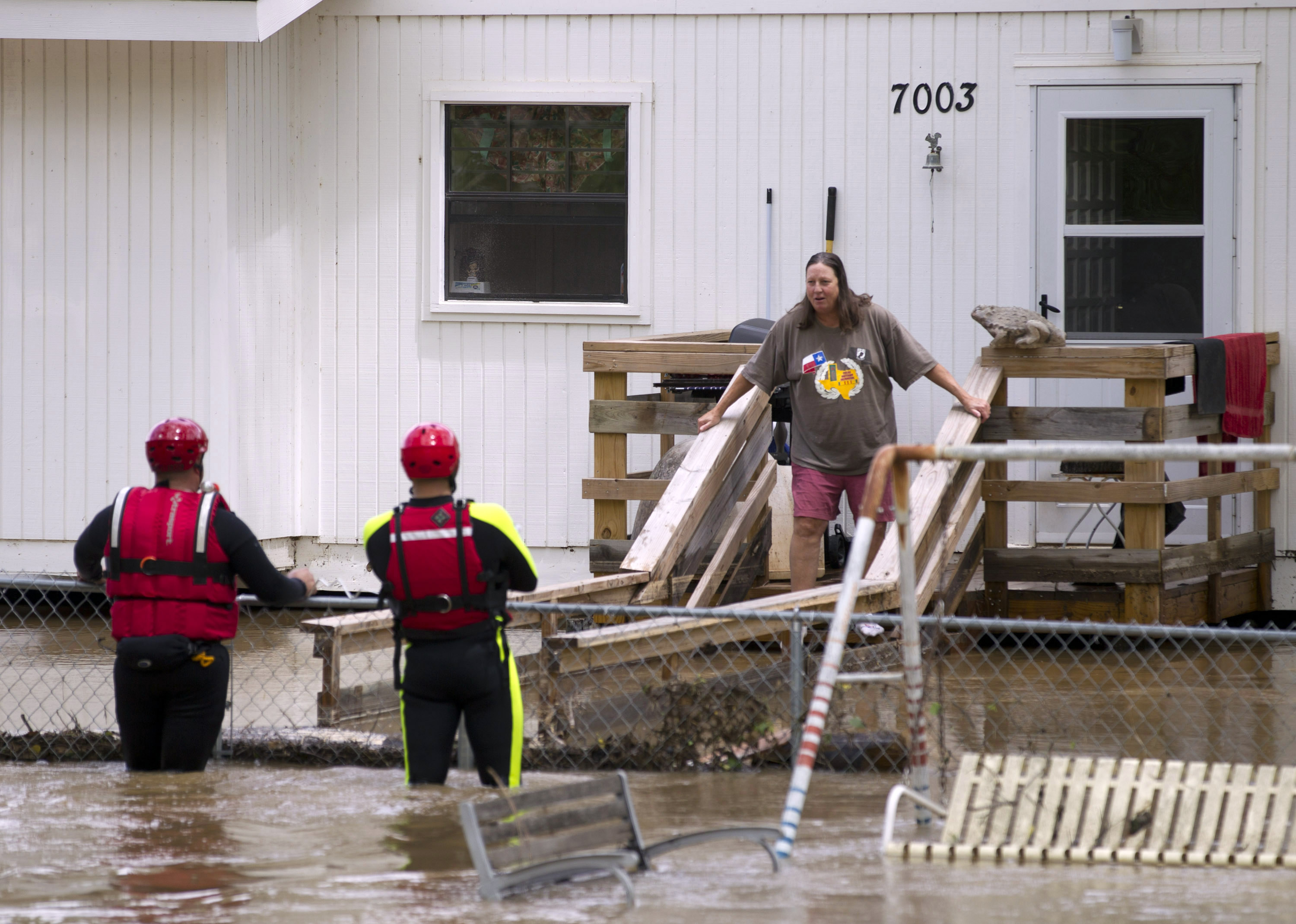 The Latest: Warnings issued for flood-control dams in Texas