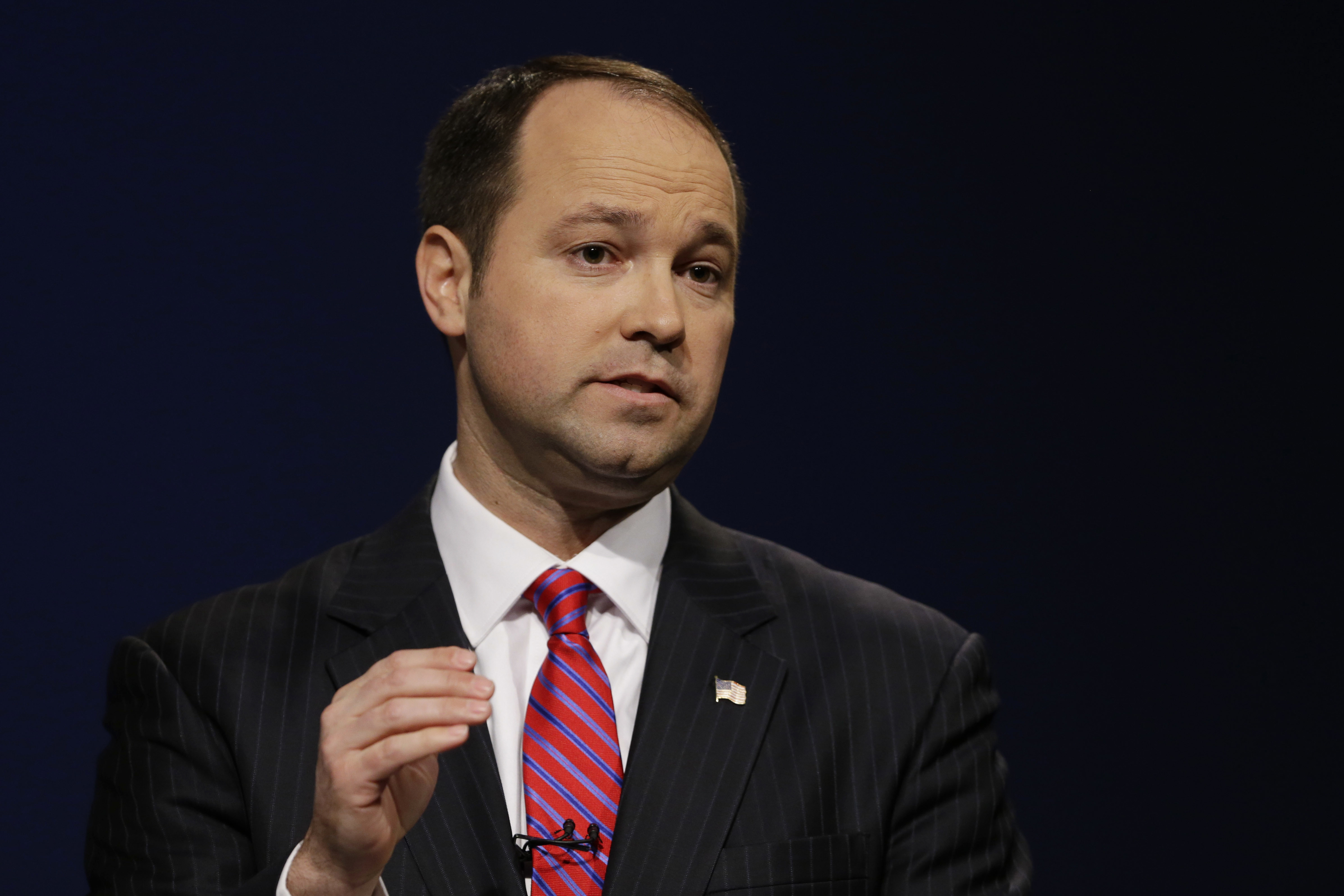 The Latest: Lawmaker defends taking family on campaign trip