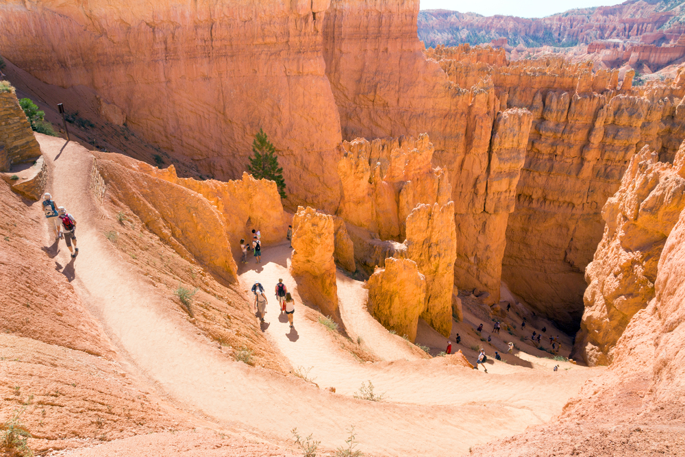 People hiking at Bryce Canyon National Park. Park officials said Friday they want to increase backcountry permit fees to cover the rising costs of increased visitation over the past 10 years.