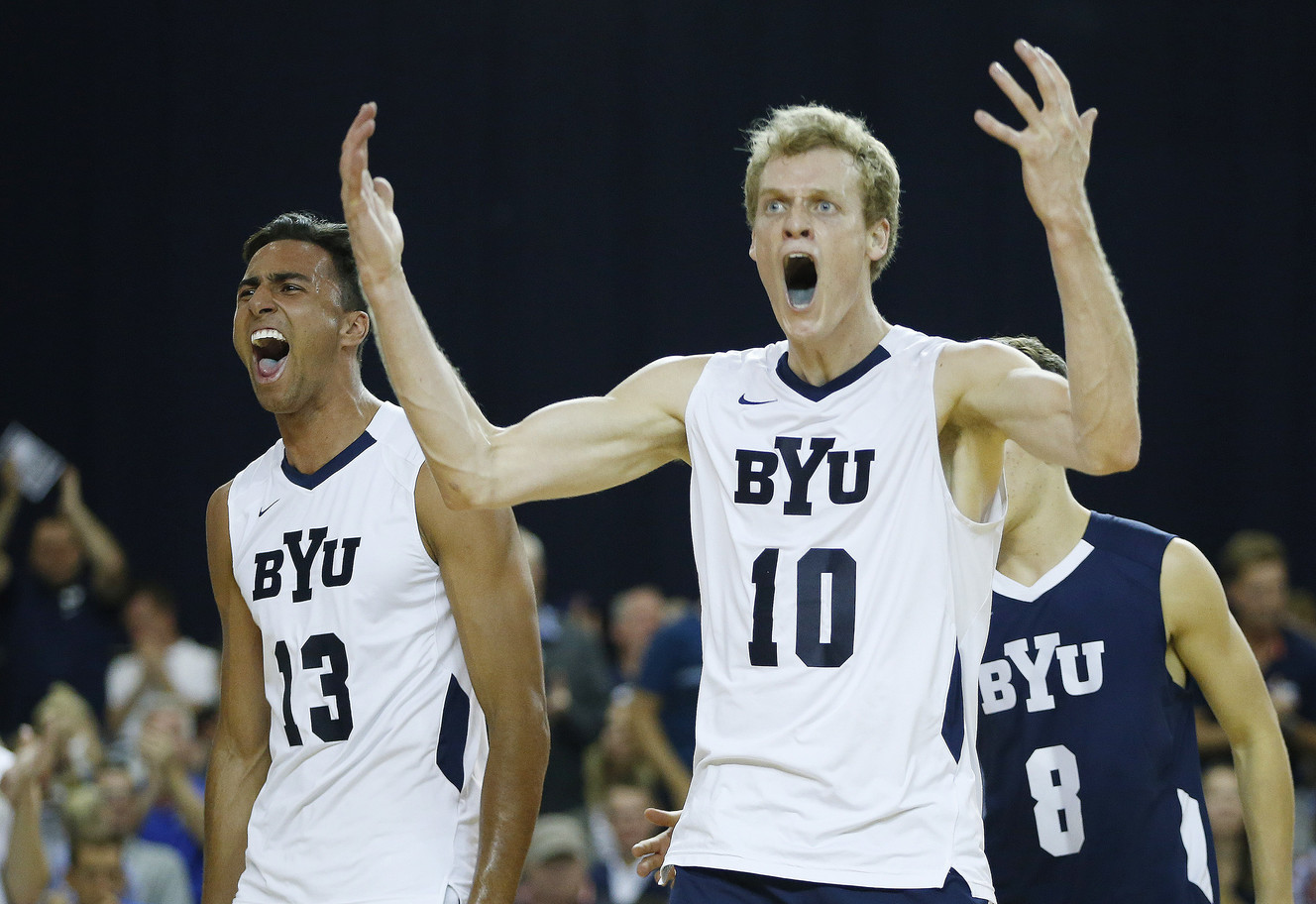 BYU's Jake LanGlois and Ben Patch celebrate a point against UC Santa Barbara during the MPSF semifinals in Provo Thursday, April 21, 2016. (Photo: Jeffrey D. Allred, Deseret News)