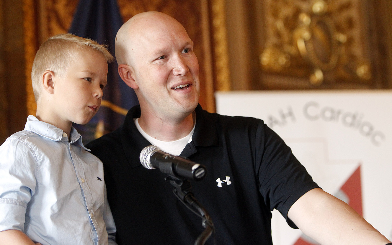 Jeff Homer, right, speaks during a press conference with his son, Alex, 9, marking the 30th anniversary of the UTAH Cardiac Transplant Program at the Capitol in Salt Lake City, Friday, April 22, 2016. Alex is a heart transplant recipient. (Photo: Chris Samuels, Deseret News)