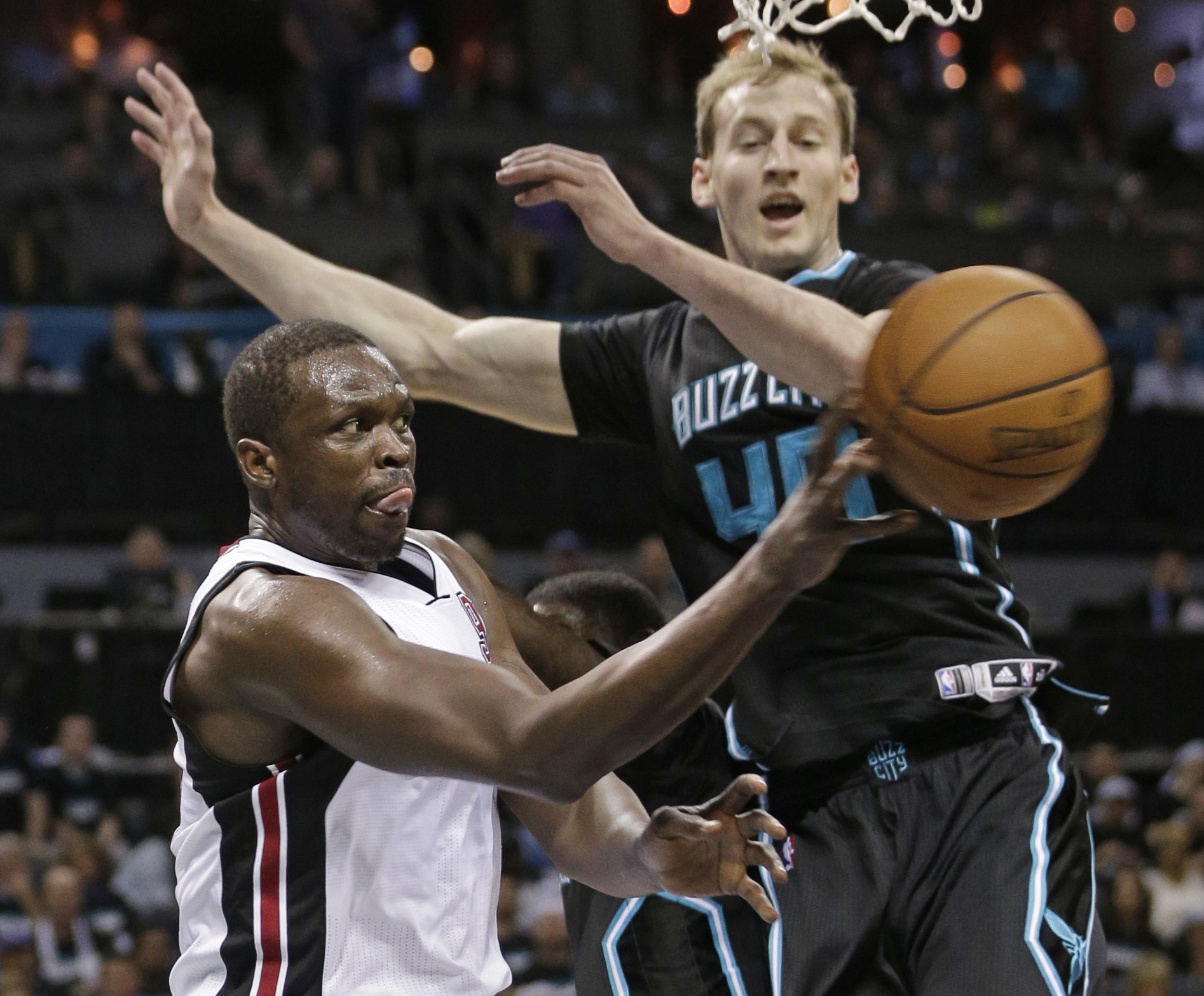 Hornets snap 14-year playoff drought, beat Heat 96-80