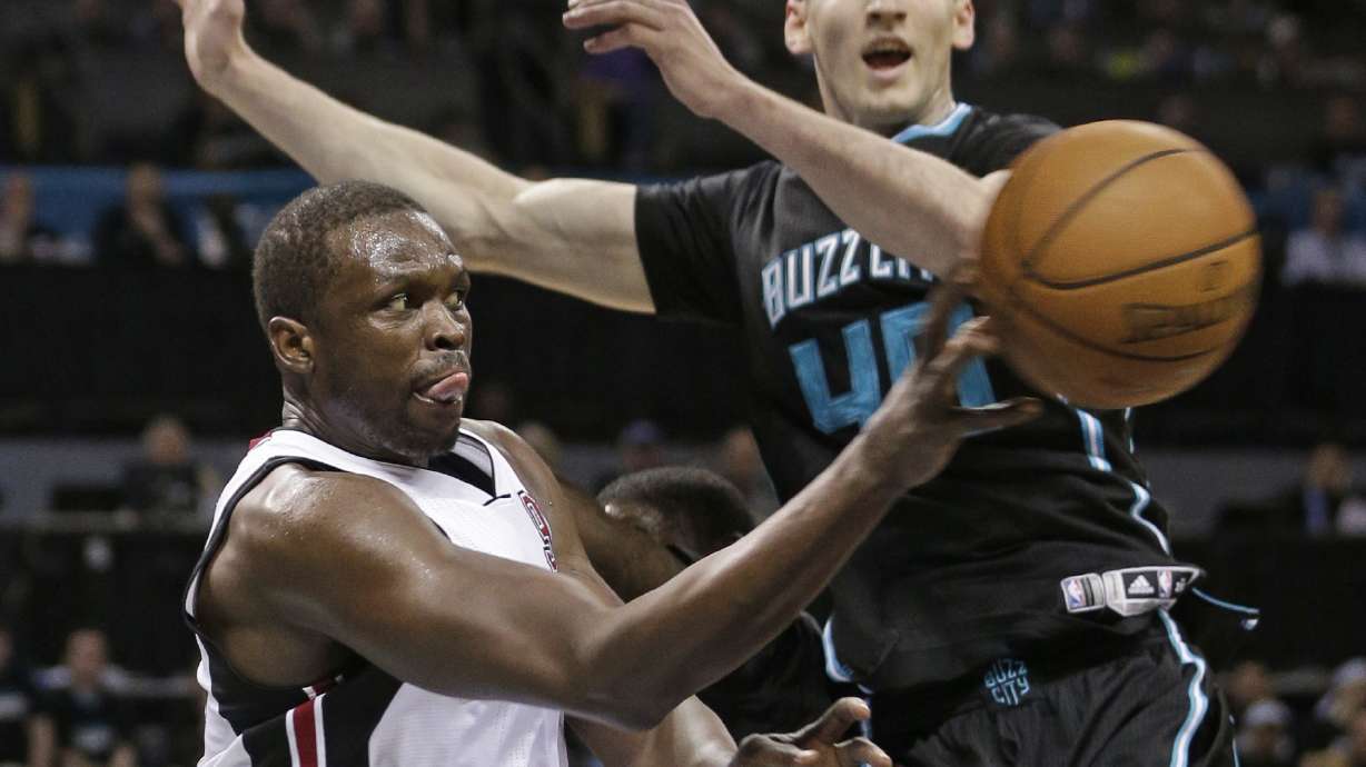 Hornets snap 14-year playoff drought, beat Heat 96-80