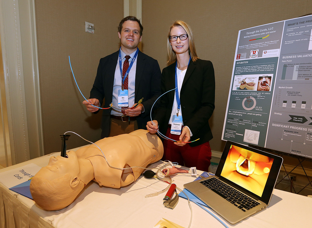 Mackenzie Hales and Benjamin Fogg, of Through the Cords, pose for a photo with steerable color-coded steerable introducers and breathing tubes during the Governor's Utah Economic Summit in Salt Lake City on Friday, April 15, 2016. The aim is to make intubation safer for patients and more streamlined for professionals. (Photo: Ravell Call, Deseret News)