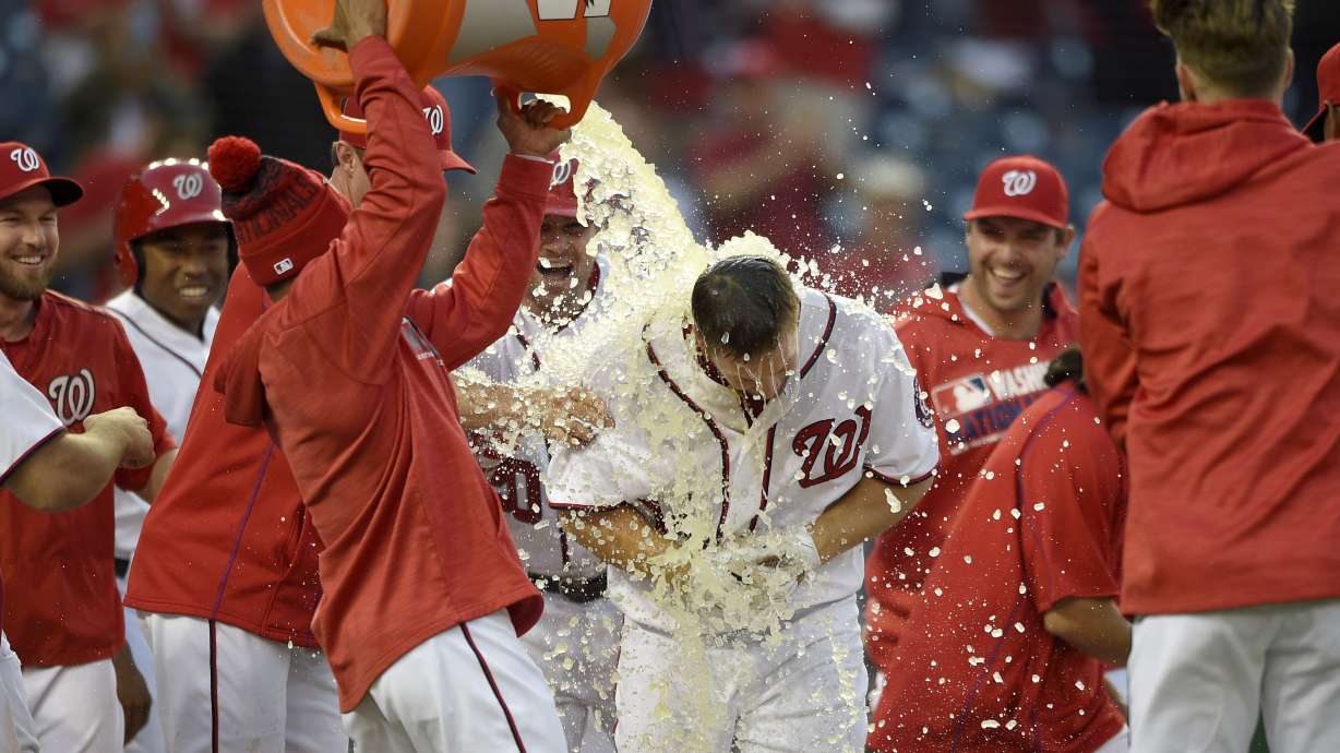 Harper, Perez set up Heisey's HR in 16th, Nats sweep Twins