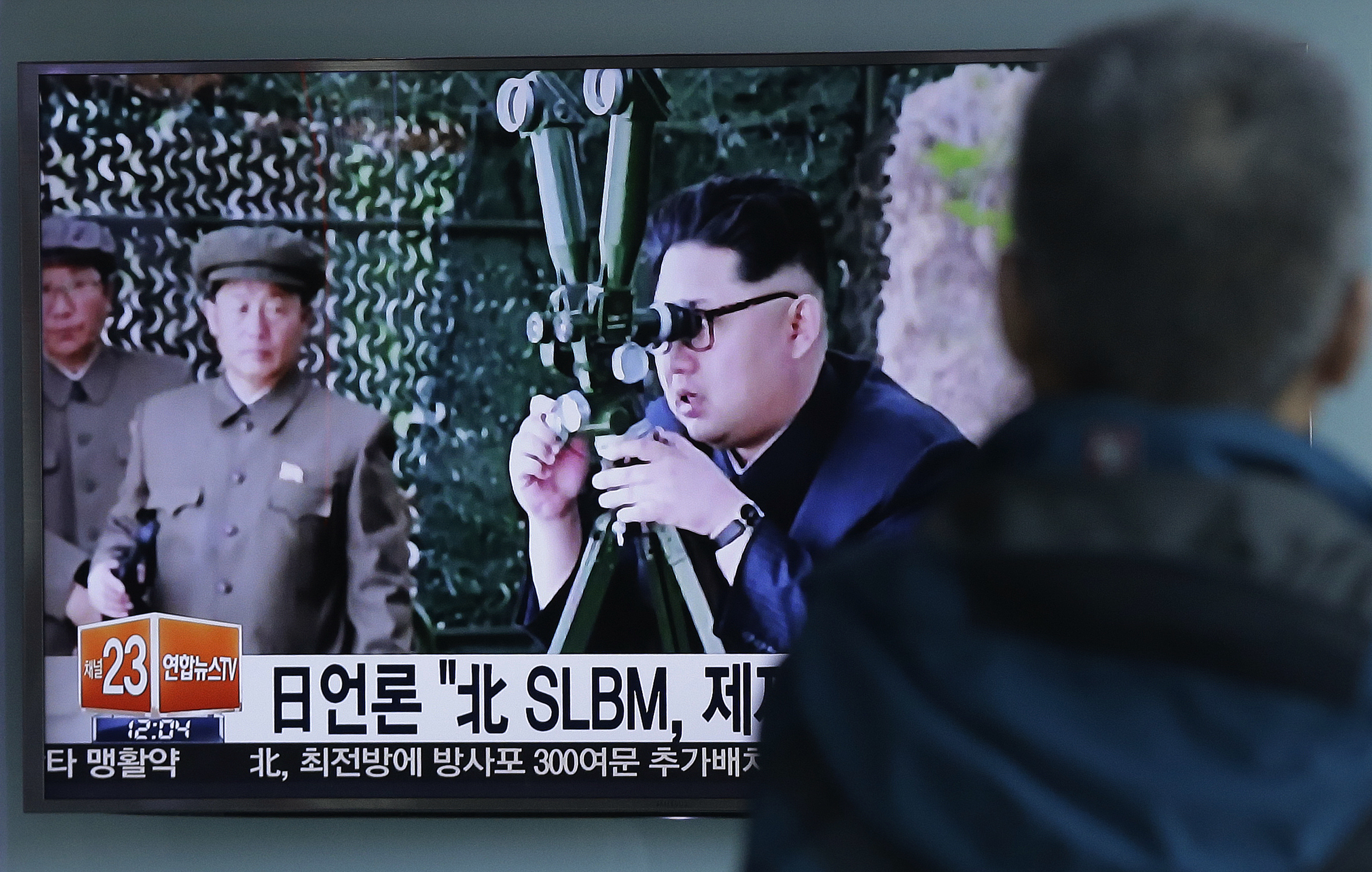 North Korea puts midrange missile on standby, report says