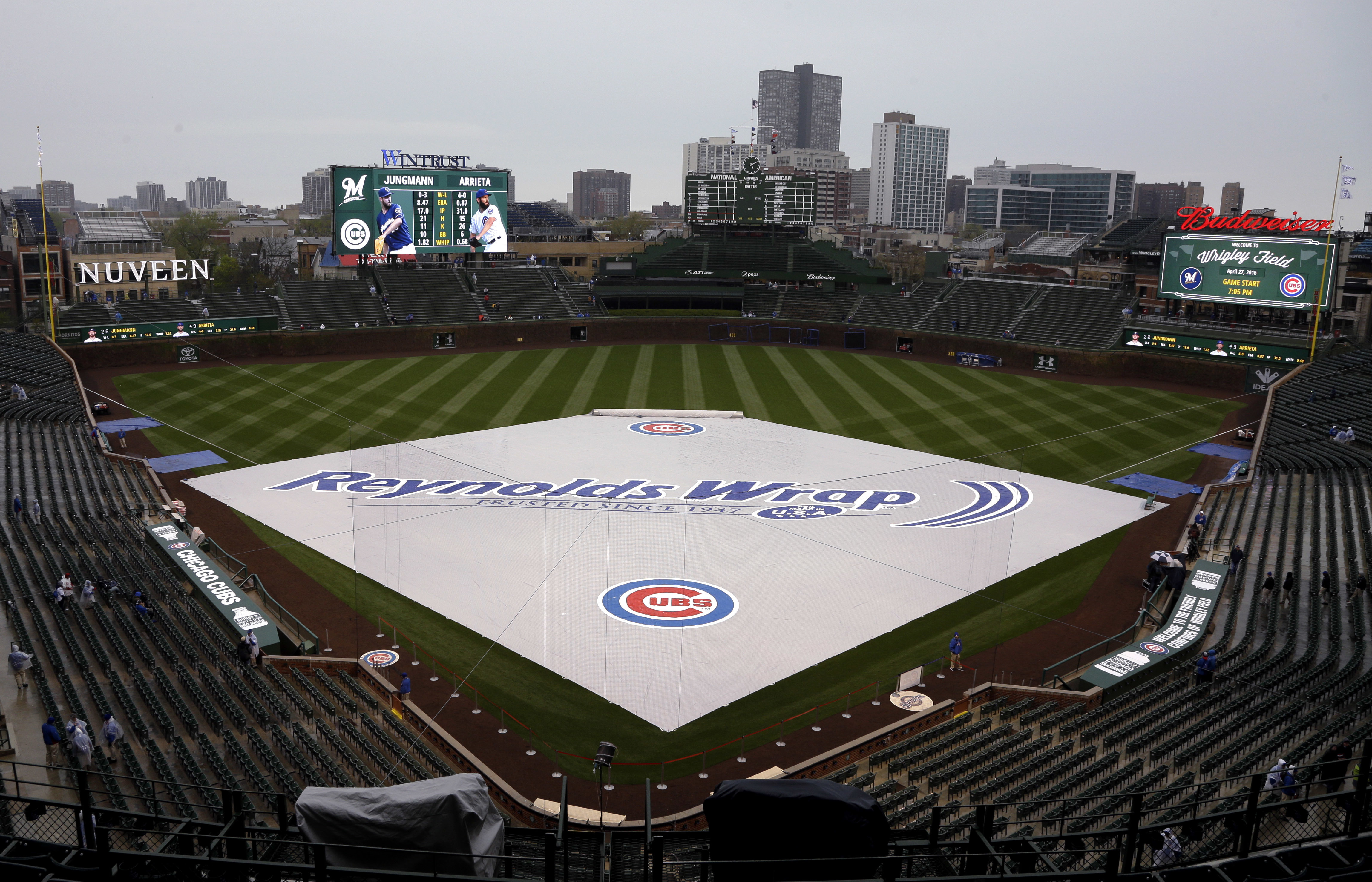 Jake Arrieta waits as Brewers and Cubs postponed by rain