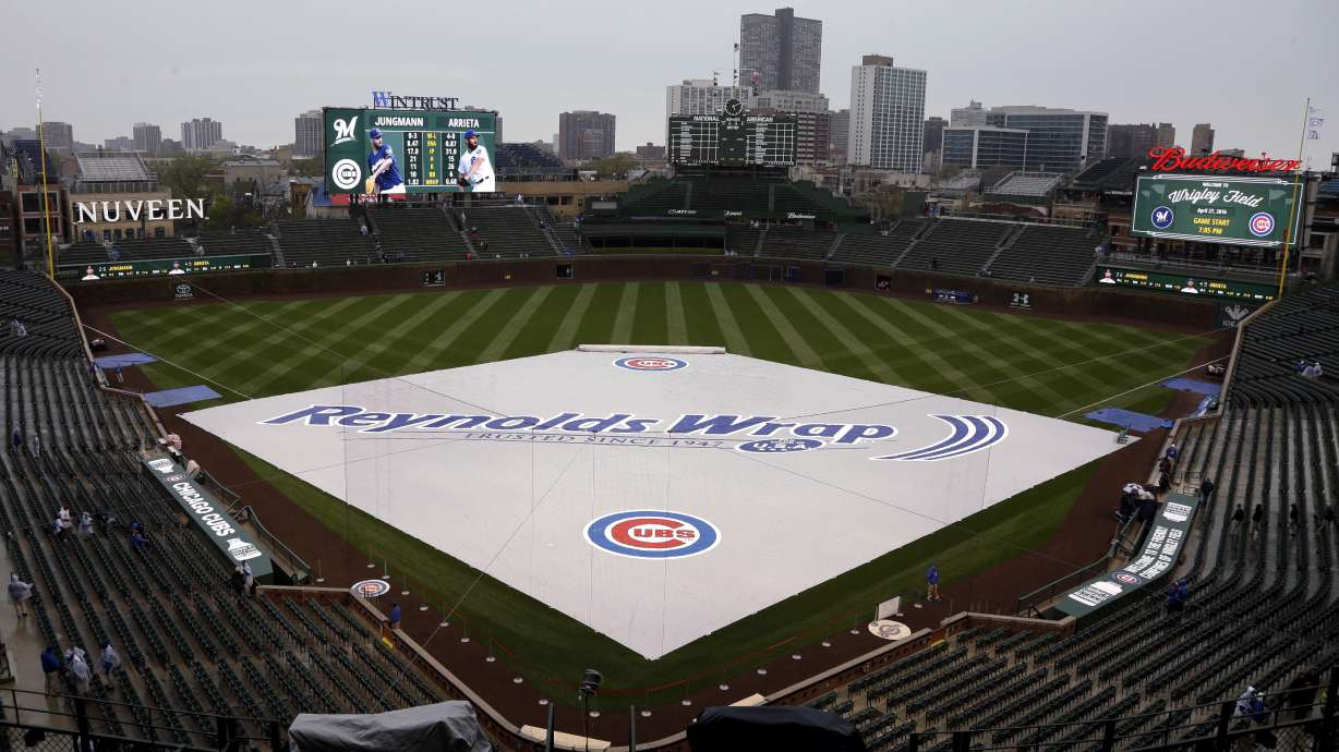 Jake Arrieta waits as Brewers and Cubs postponed by rain