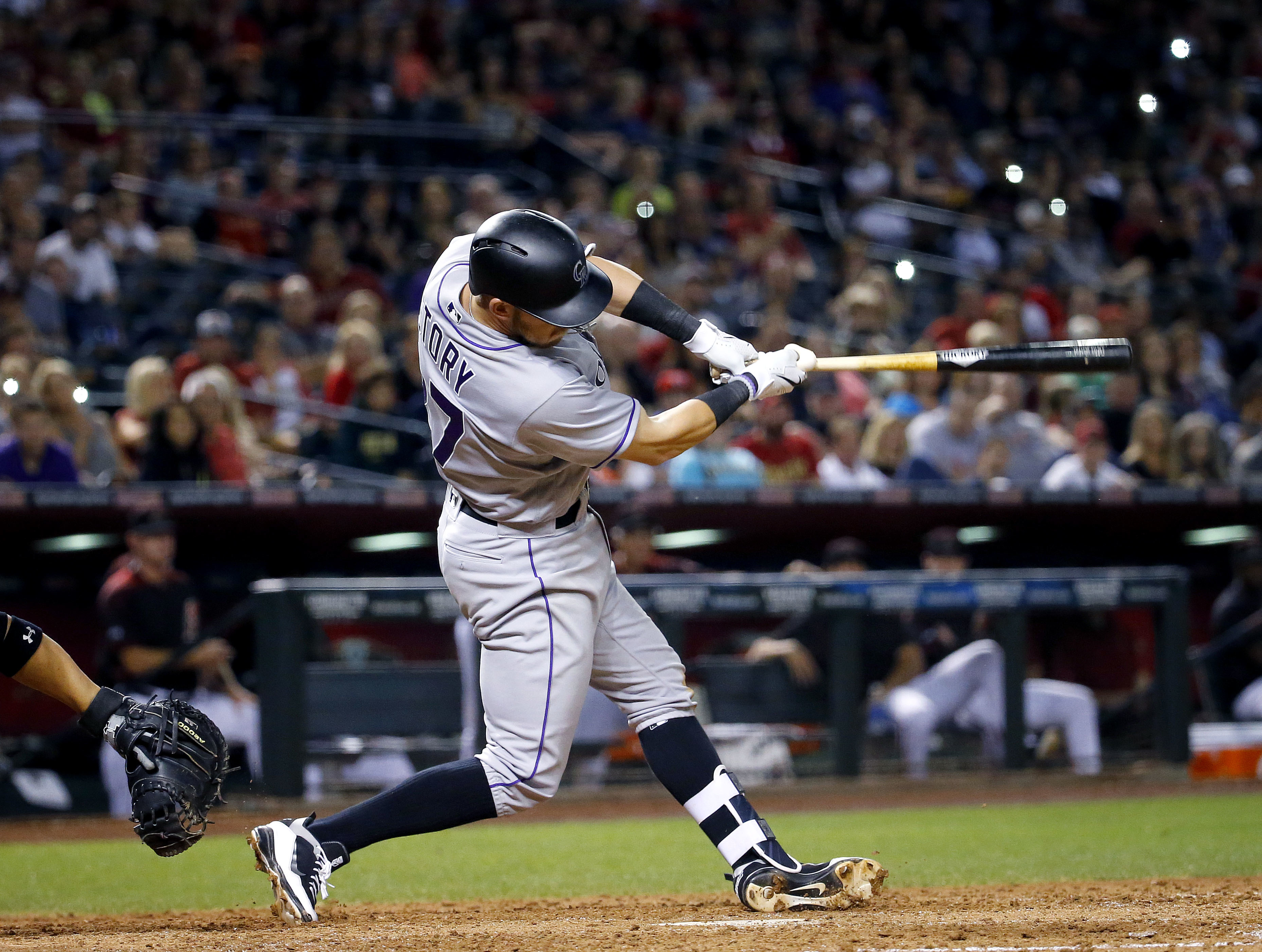 Story drives in three in Rockies' win over Diamondbacks