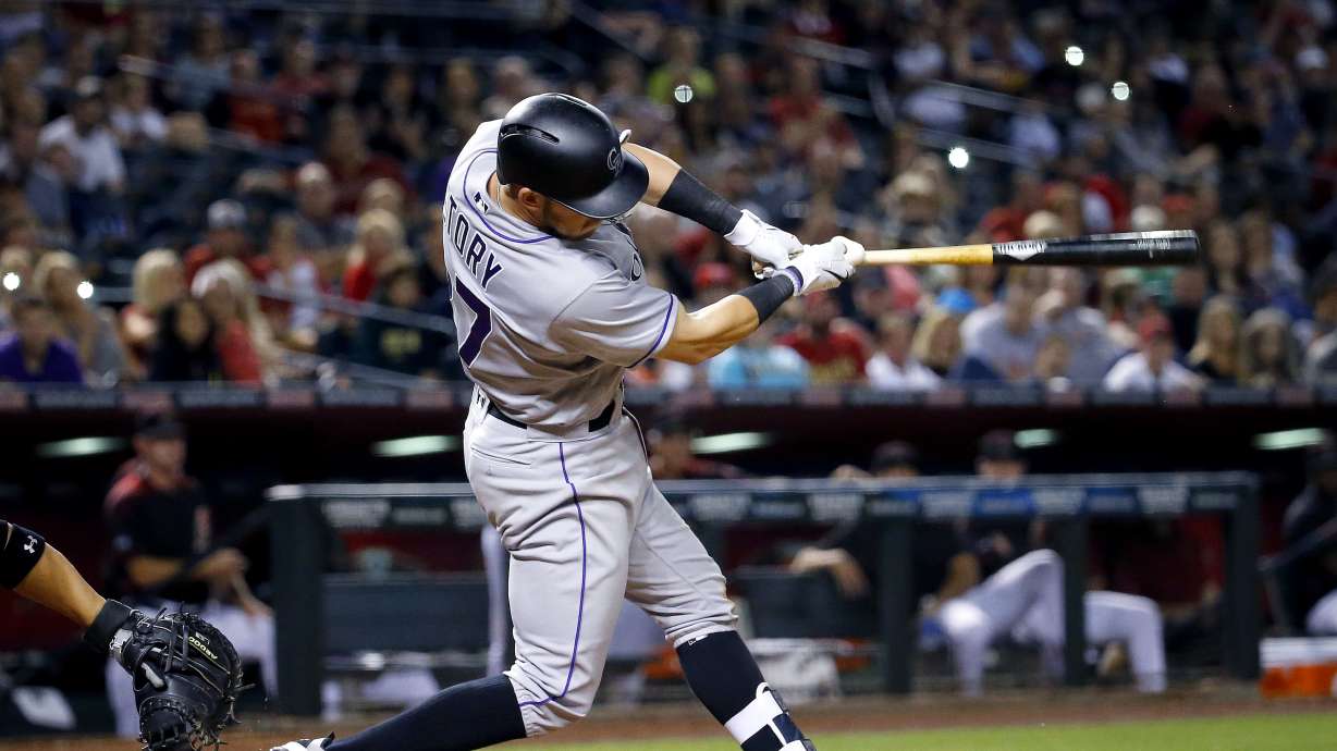 Story drives in three in Rockies' win over Diamondbacks