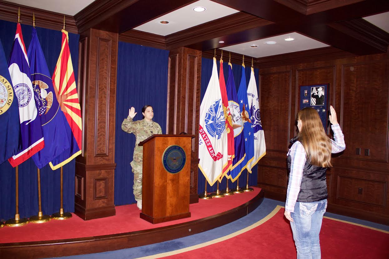 Tara McCaig takes the oath of enlistment at the Military Entrance Processing Station. (Photo: McCaig family photo)