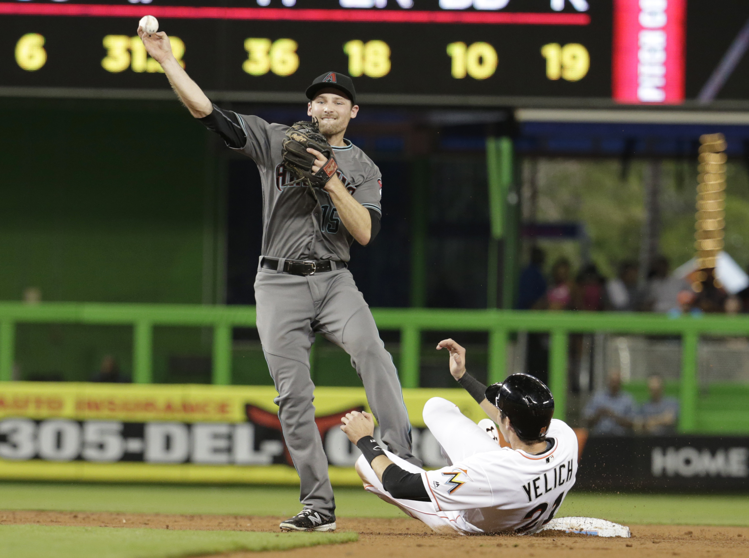 Suzuki's pinch-hit helps Marlins beat Arizona 7-4