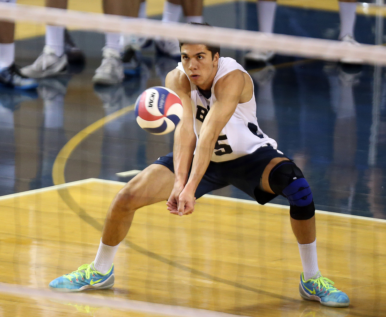 BYU outside hitter Brenden Sander (15) receives a serve during the MPSF men's volleyball tournament championship against the UCLA Bruins at the Smith Fieldhouse in Provo, April 23, 2016. (Photo: Chris Samuels, Deseret News)