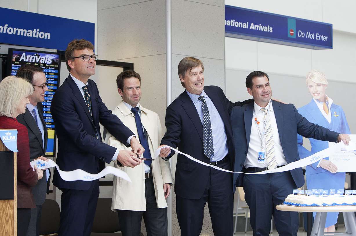 Executives cut a ribbon to celebrate the event at the Salt Lake City International Airport, Thursday, May 5, 2016. KLM entered the Salt Lake market with a nonstop flight from Amsterdam. (Photo: Hans Koepsell, Deseret News)