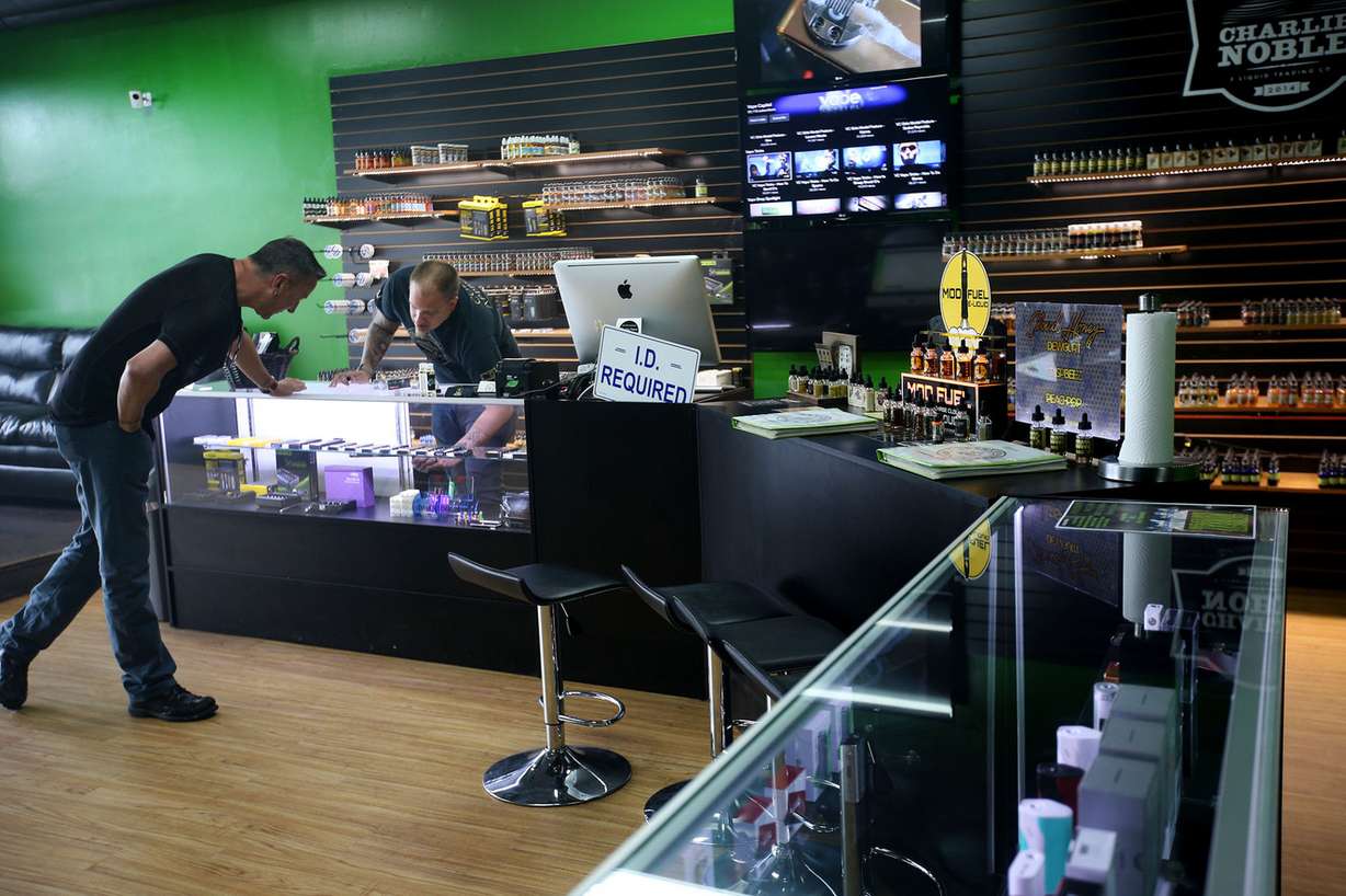 Tad Jensen, director of operations at Electronicstix, right, helps Steven Banuelos at Electronicstix in Murray on Thursday, May 5, 2016. (Photo: Laura Seitz, Deseret News)