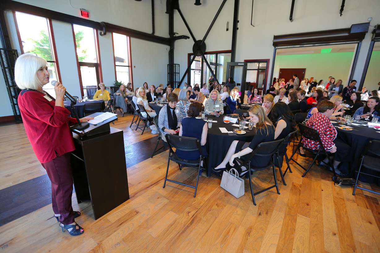 Patricia Jones welcomes the women to the Women's Leadership Institute and the Salt Lake Chamber's ElevateHer Challenge at a networking event at the Falls Event Center at Trolley Square in Salt Lake City on Wednesday, May 11, 2016. (Photo: Scott G Winterton, Deseret News)