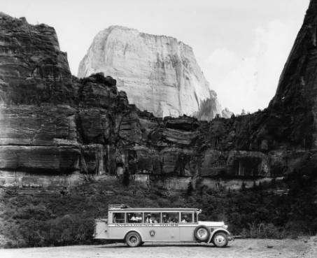 A tourist bus at the Great White Throne in Zion National Park. Photo dated somewhere between 1920-1940. (Photo: Photo Courtesy Utah State Historical Society)
