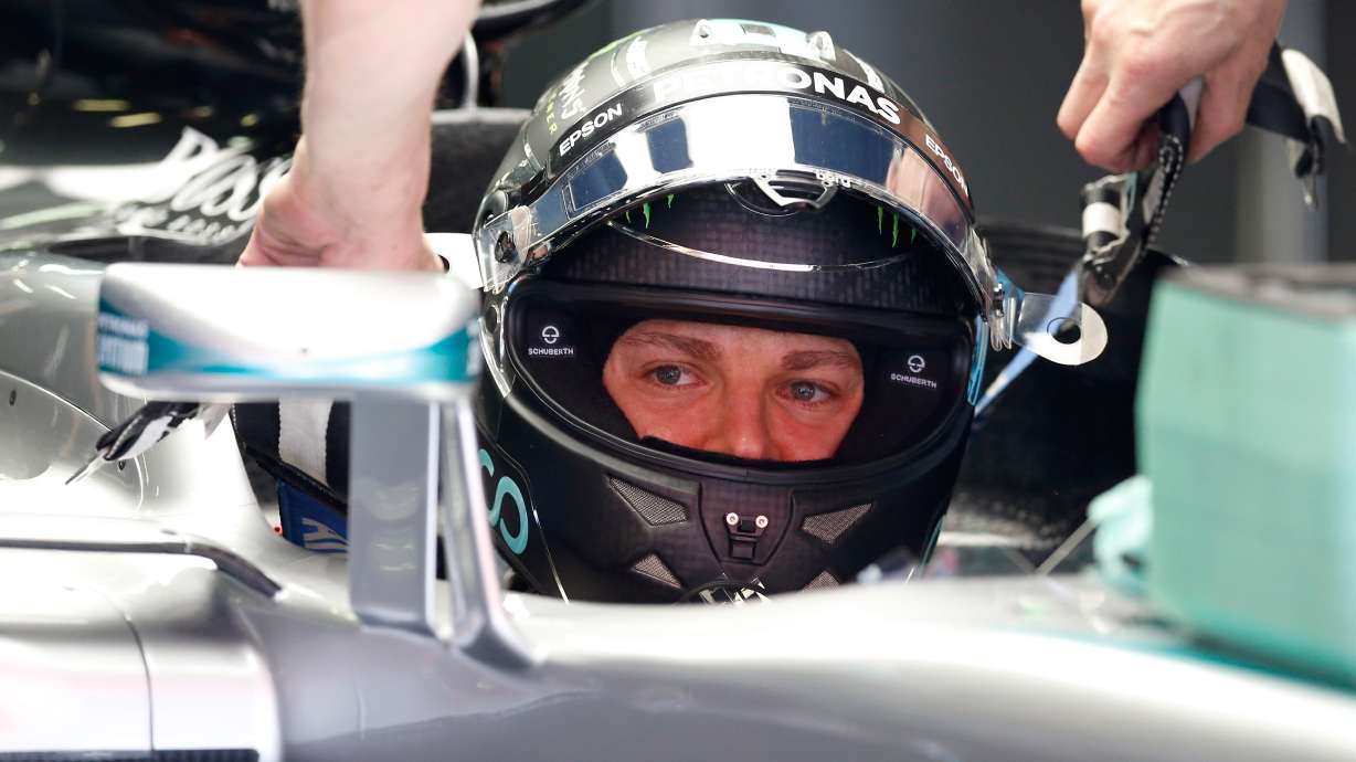 Hamilton edges Rosberg to win pole position for Spanish GP