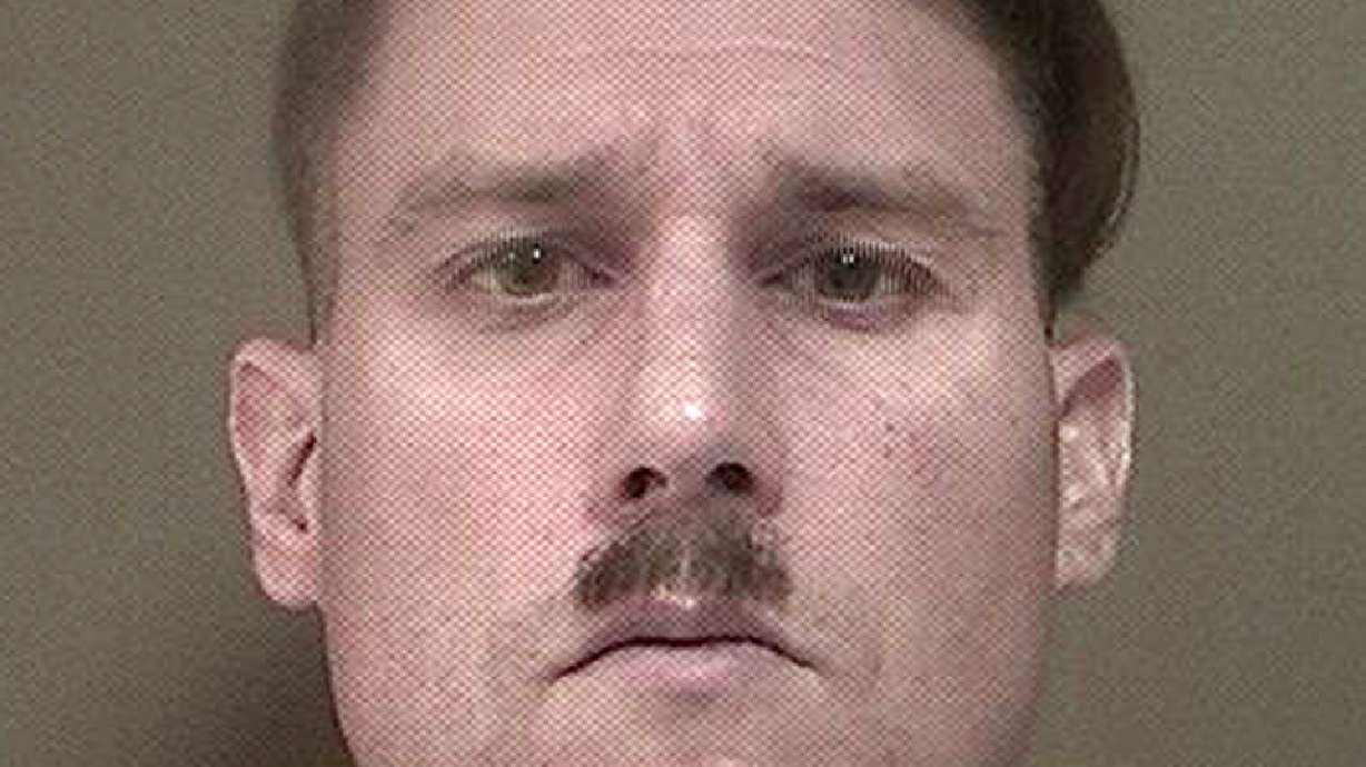 Man with Hitler mustache charged in weapons, ammo case