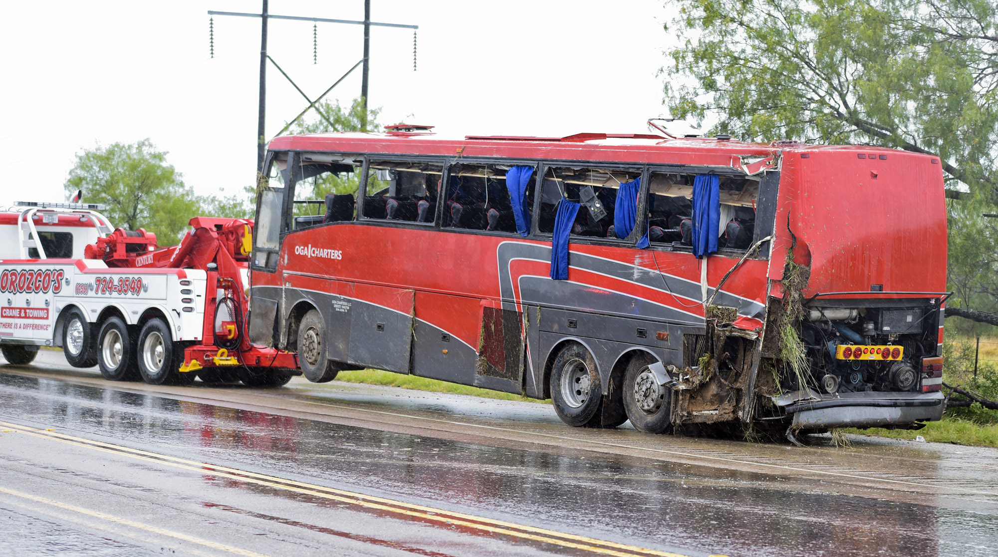 The Latest: Highway to be closed for bus crash investigation