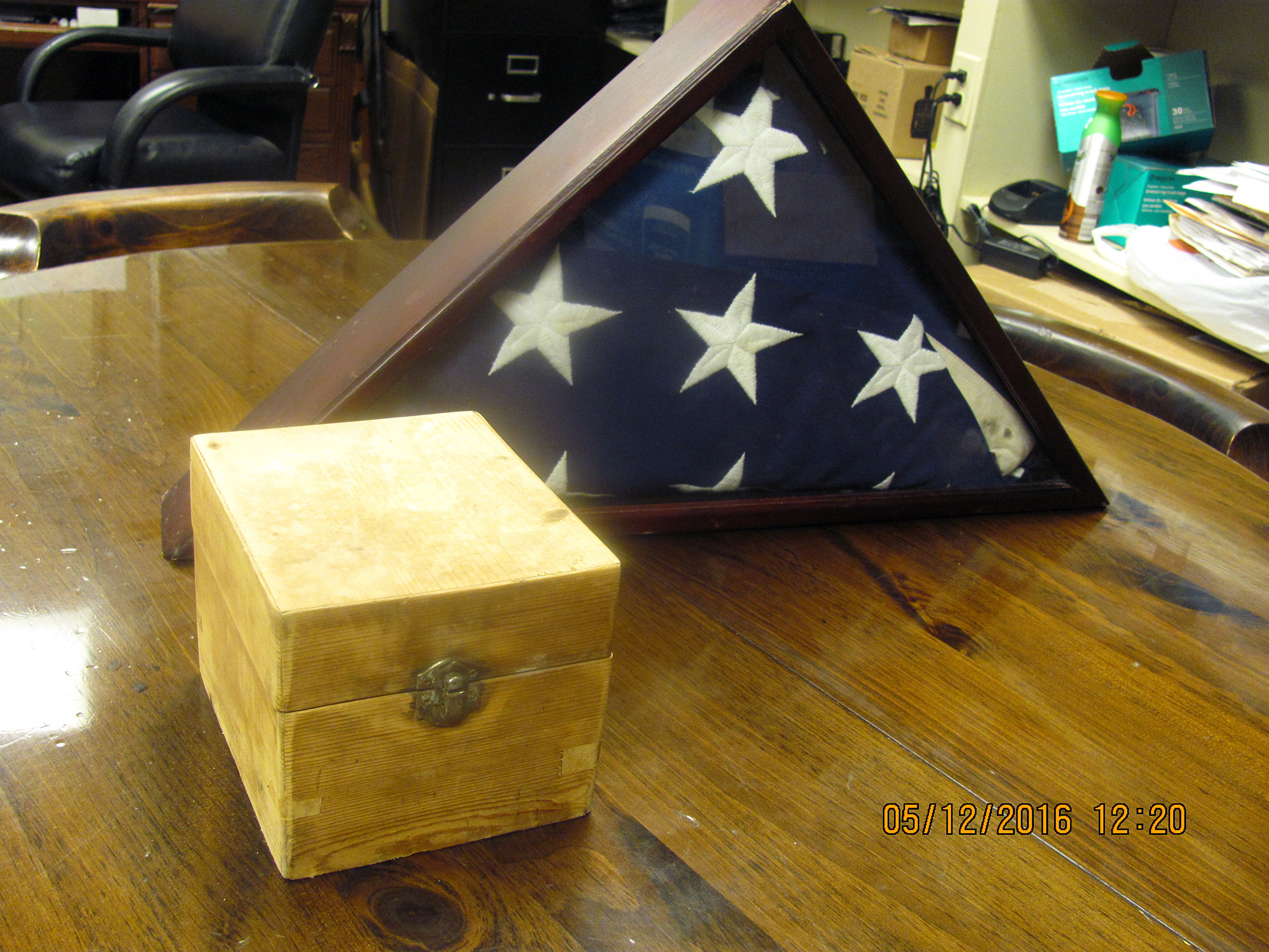 Mystery of abandoned human ashes with flag baffles police