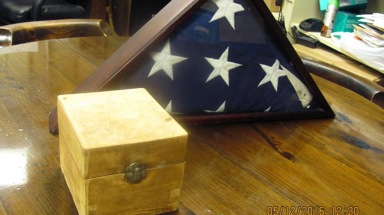 Mystery of abandoned human ashes with flag baffles police