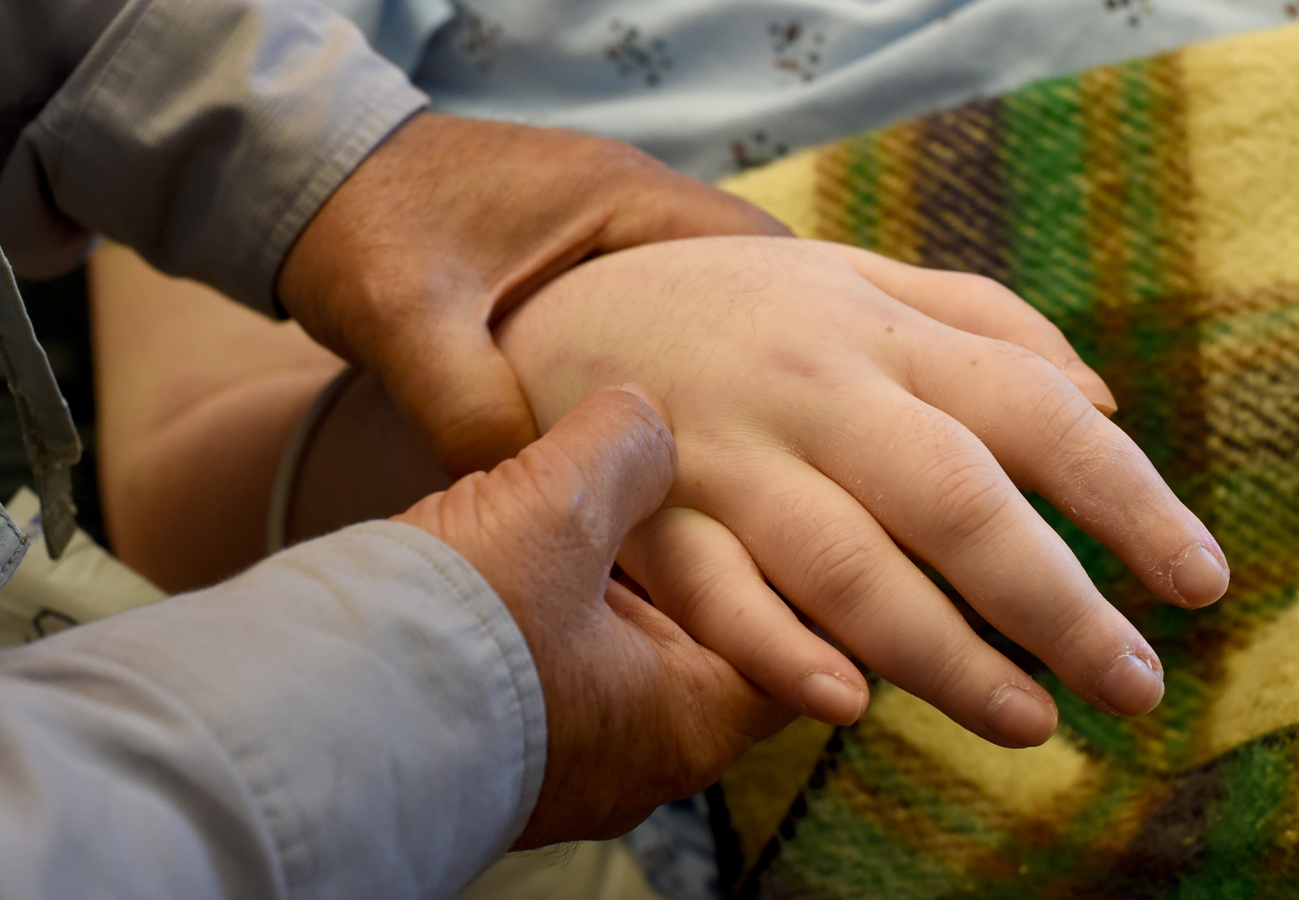 Records: Doctors say woman declared brain dead still alive