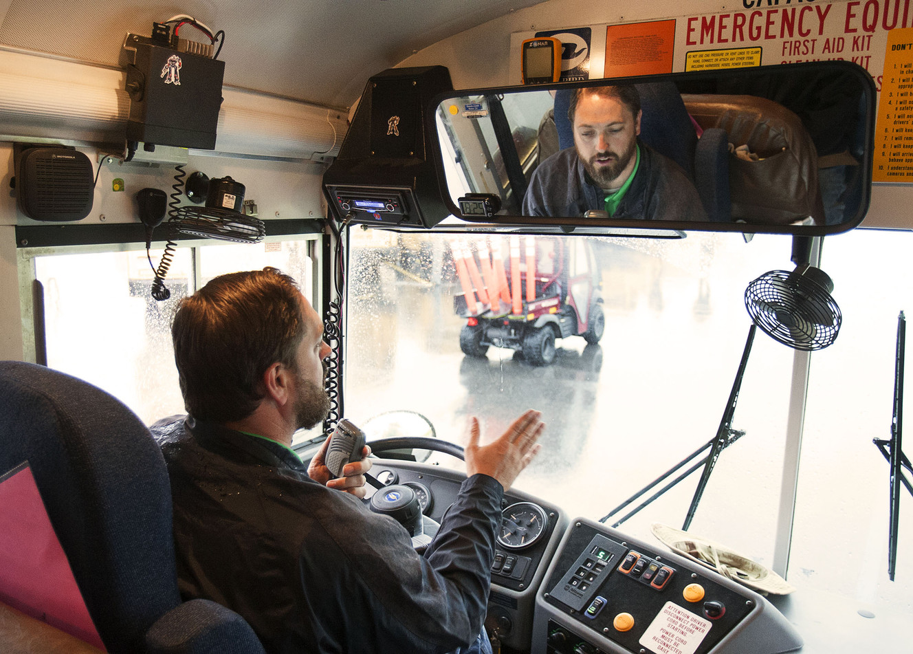 Rich Eddington drives contestants around the obstacle course prior to the the Utah State Safety Skill Competition for school bus drivers in West Jordan on Saturday, May, 21, 2016. (Photo: Hans Koepsell, Deseret News)