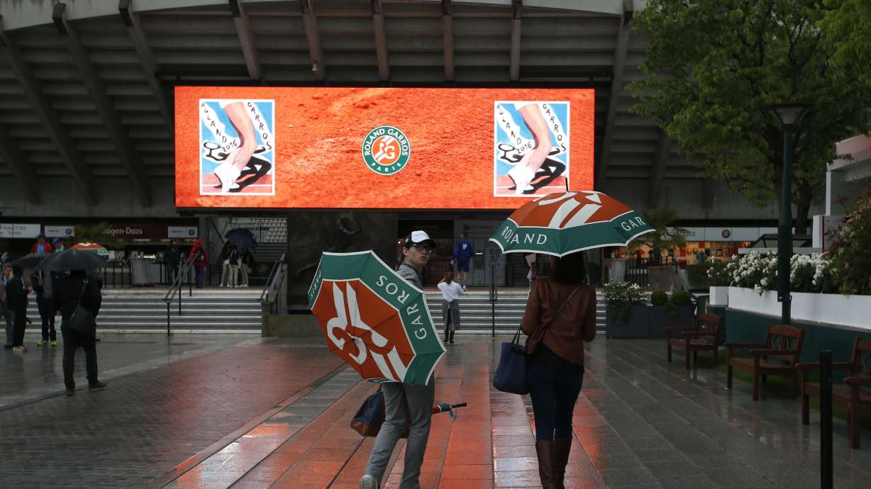 The Latest: Safarova dodges rain for French Open win