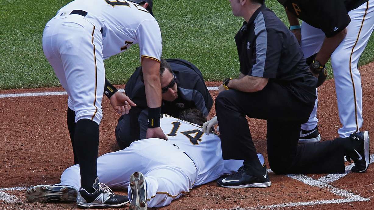Pirates' Vogelsong hit in head by pitch in win over Rockies