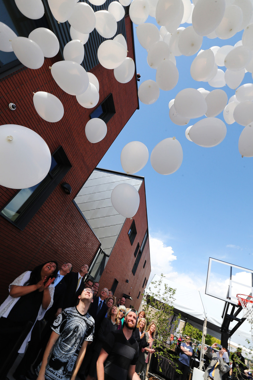 Balloons are released during the opening of the Volunteers of America–Utah's Youth Resource Center in Salt Lake City on Tuesday, May 24, 2016. The new 30-bed shelter will offer 24/7 support and enhanced programming for struggling with homelessness. (Photo: Jeffrey D. Allred, Deseret News)