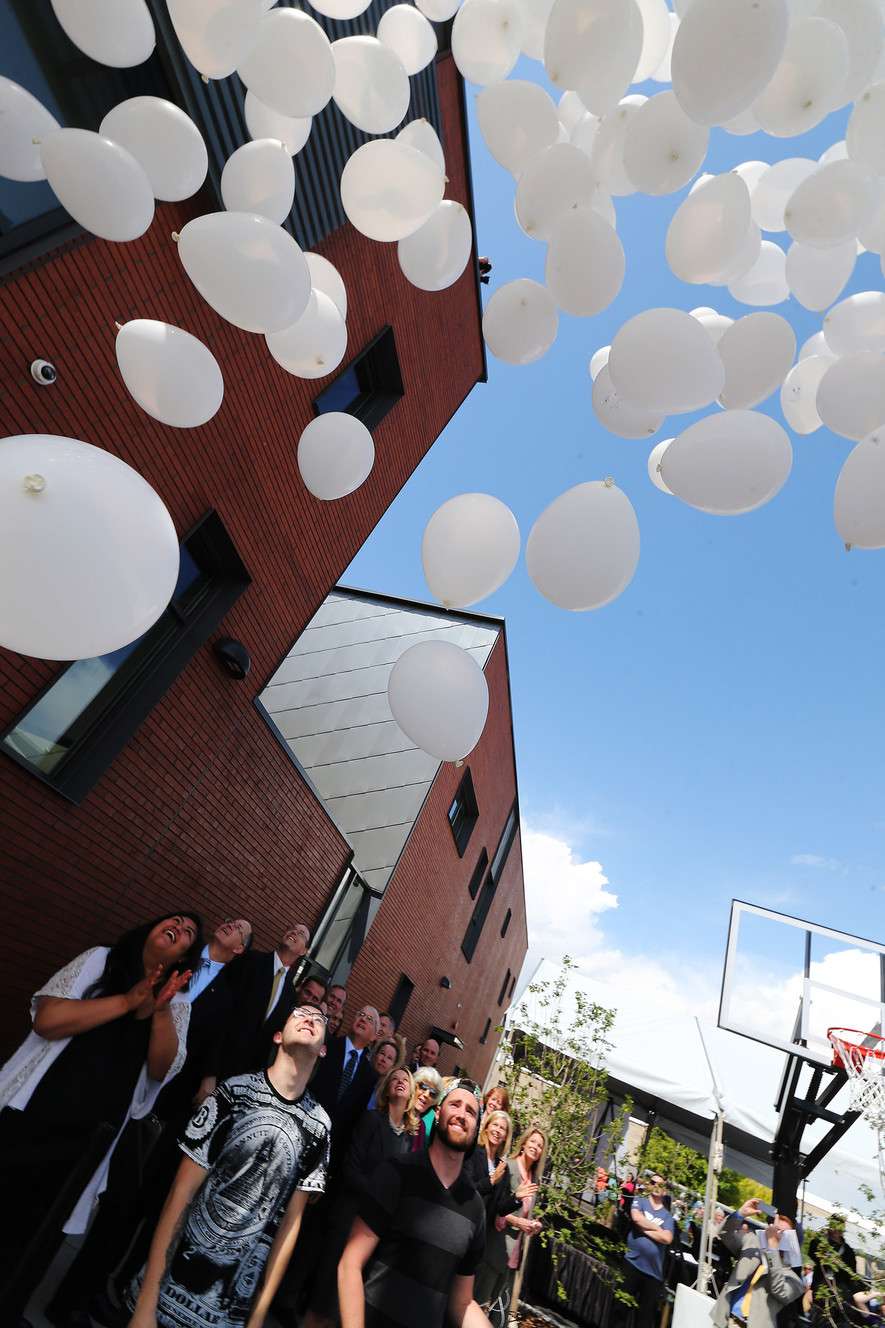 Balloons are released during the opening of the Volunteers of America–Utah's Youth Resource Center in Salt Lake City on Tuesday, May 24, 2016. The new 30-bed shelter will offer 24/7 support and enhanced programming for struggling with homelessness. (Photo: Jeffrey D. Allred, Deseret News)