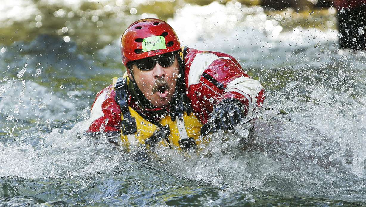 Unified firefighter Mike Quinones trains for swift water rescue on the Provo River in Provo Canyon on Wednesday, May 25, 2016. (Photo: Jeffrey D. Allred, Deseret News)