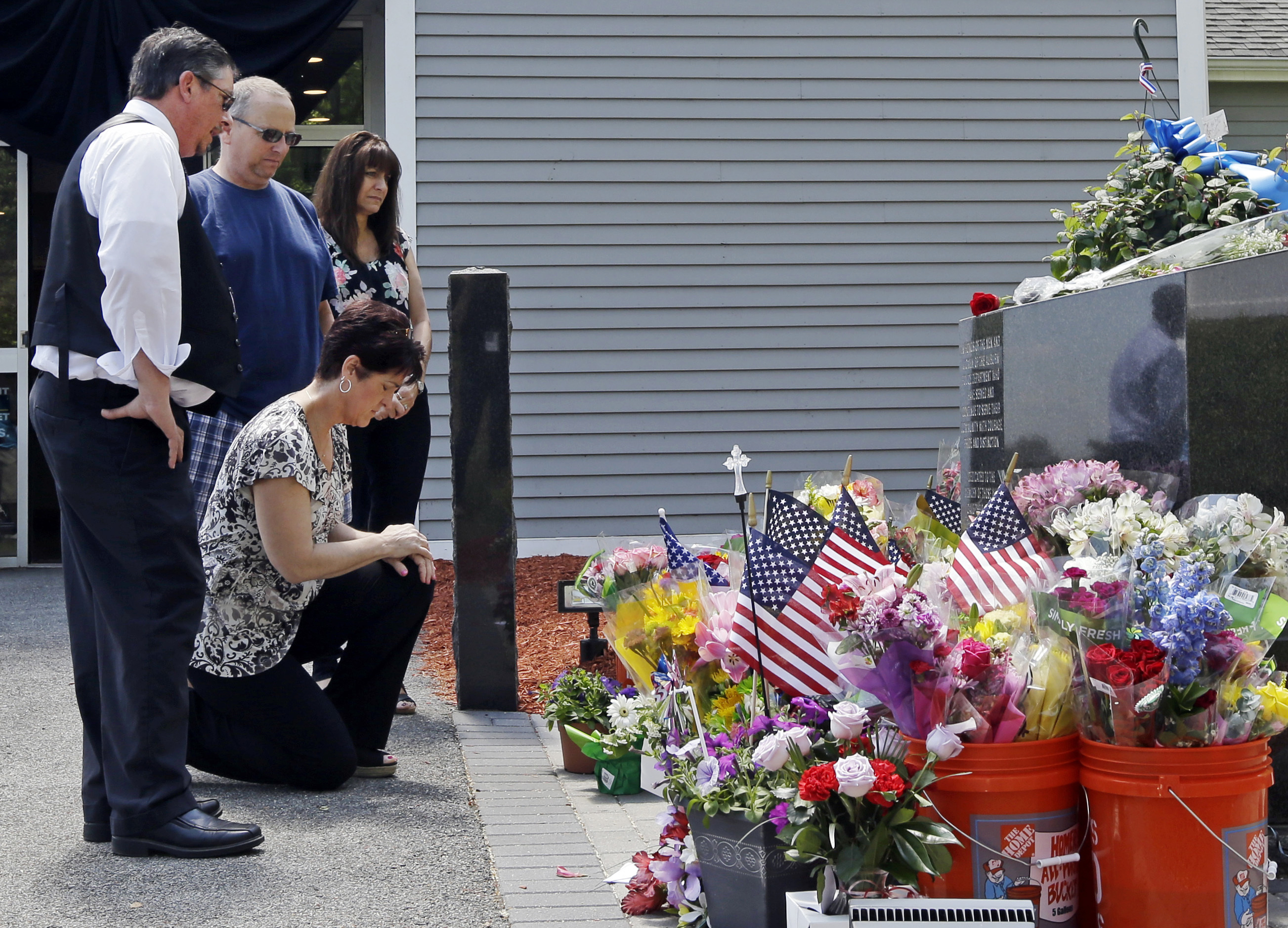 The Latest: Wake held for officer shot during traffic stop