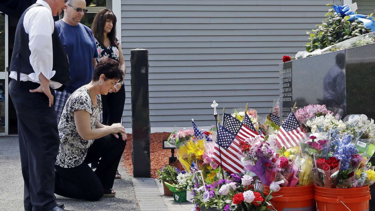 The Latest: Wake held for officer shot during traffic stop