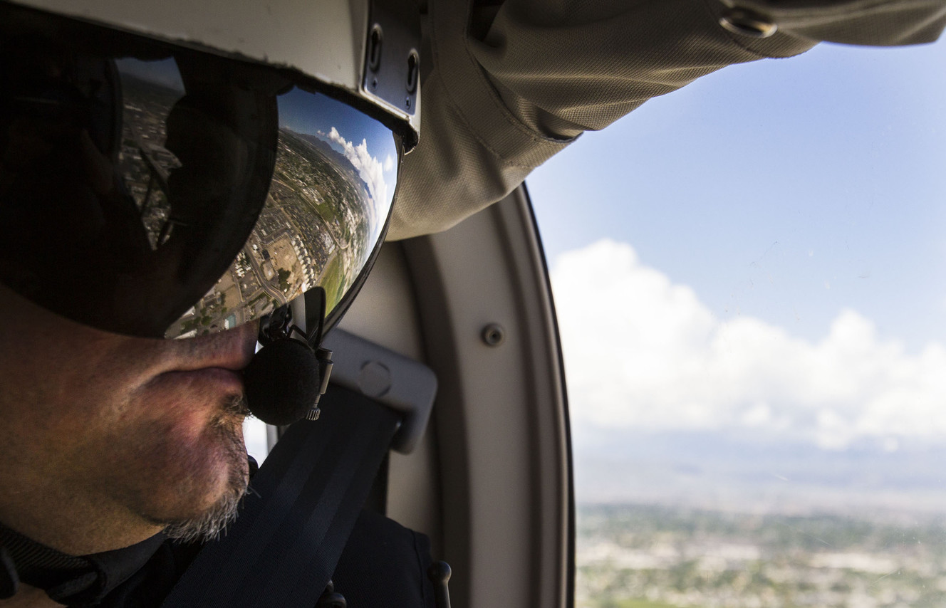 Flight nurse Brain Simpson patrols the roads over West Valley City inside an AirMed helicopter on Thursday, May 26, 2016.
Memorial Day weekend is the start of the 100 deadliest days of the year on Utah roads. The Utah Department of Transportation, the Utah Department of Public Safety and AirMed are teaming up to encourage zero fatalities. (Photo: Weston Kenney, Deseret News)