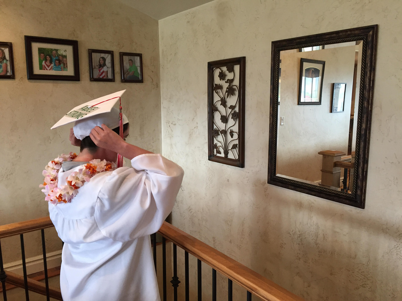 Kelsie Albee, now cancer free, gets ready for her high school graduation from Manti High School, Friday, May 27, 2016. (Photo: Sam Penrod, Deseret News)