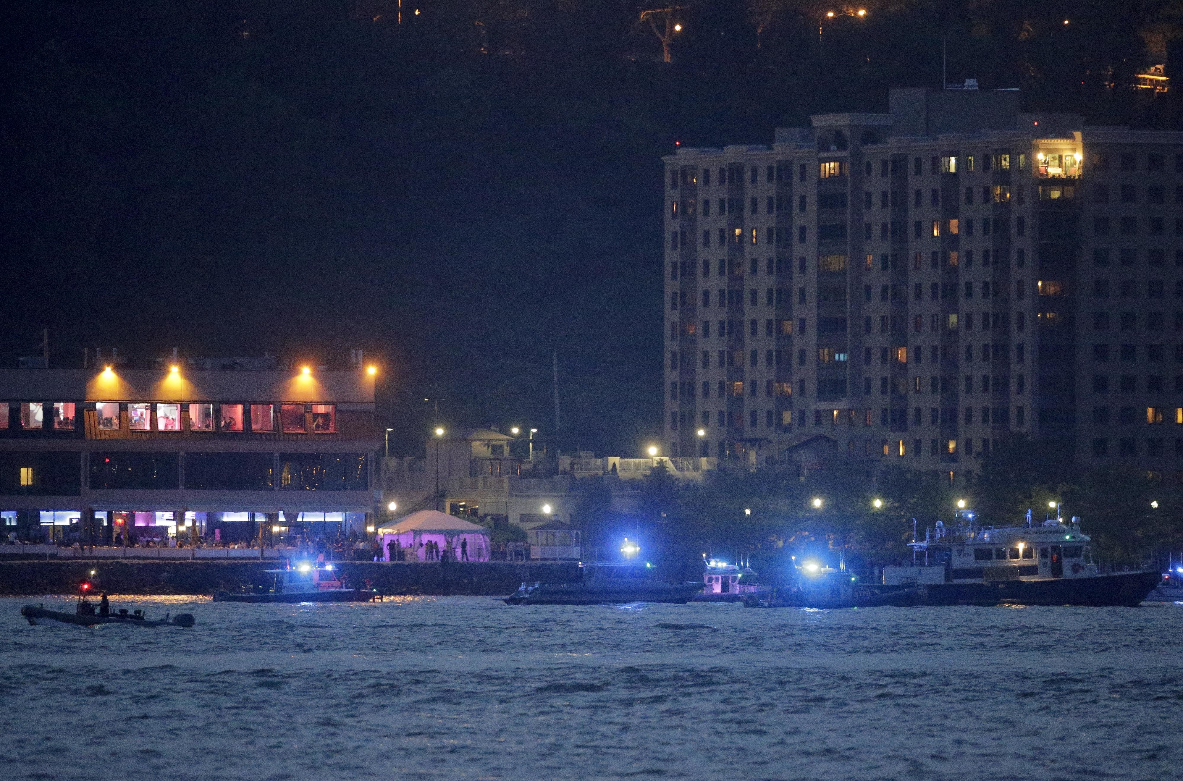 The Latest: Police identify body pulled from Hudson crash
