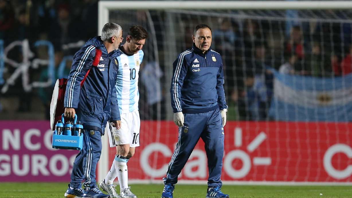 Argentine star Messi leaves Honduras match with back injury