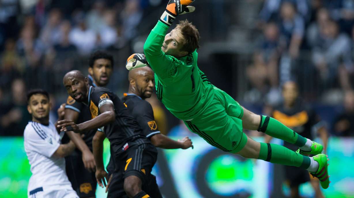 Dynamo tie Whitecaps 1-1 in first game since coach resigned