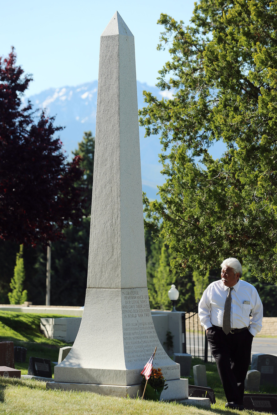 Robin Doi looks at a monument following a memorial service honoring Japanese-American veterans at the Salt Lake City Cemetery on Sunday, May 29, 2016. (Photo: Scott G Winterton, Deseret News)