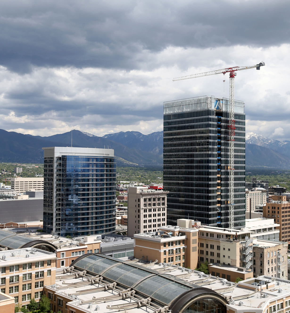 Some residents at The Regent (the building on the left in the photograph) have lost their views now that 111 Main Street is being constructed. Some residents of City Creek Living at 99 West are concerned that a large Salt Lake convention hotel at the Salt Palace would impact the views from their condominiums in a similar way. Photo taken in Salt Lake City on Friday, May 27, 2016. (Photo: Laura Seitz, Deseret News)