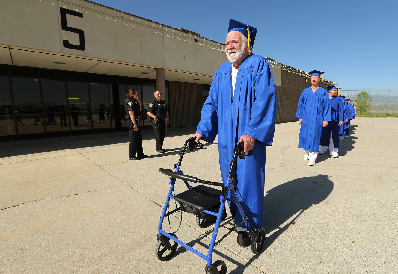 John Neely, 74, leaves the South Park Academy commencement ceremonies after getting his diploma on Wednesday, June 1, 2016, at the Utah State Prison in Draper. (Photo: Jeffrey D. Allred, Deseret News)