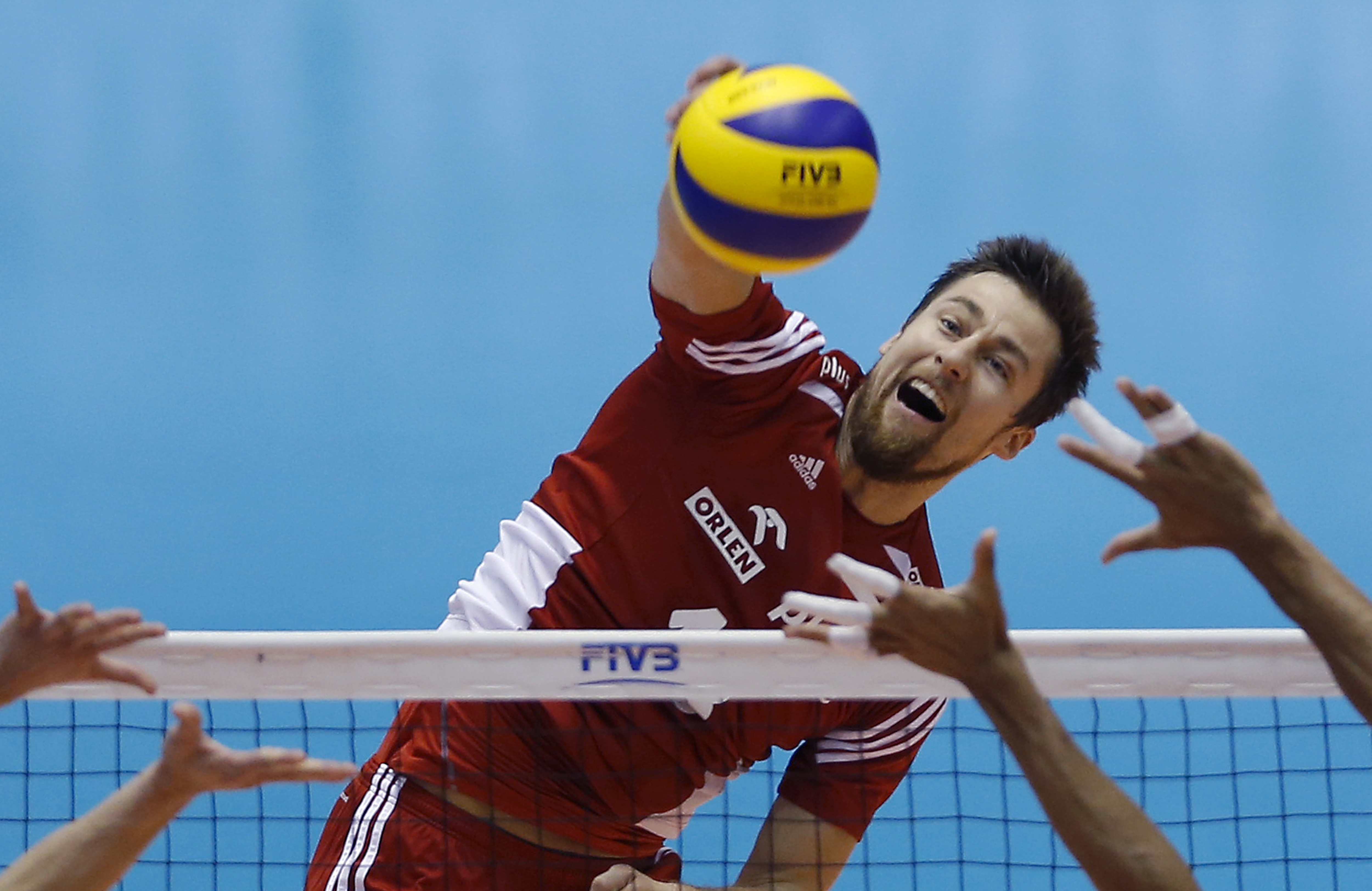 Poland secures Olympic volleyball berth by beating Venezuela