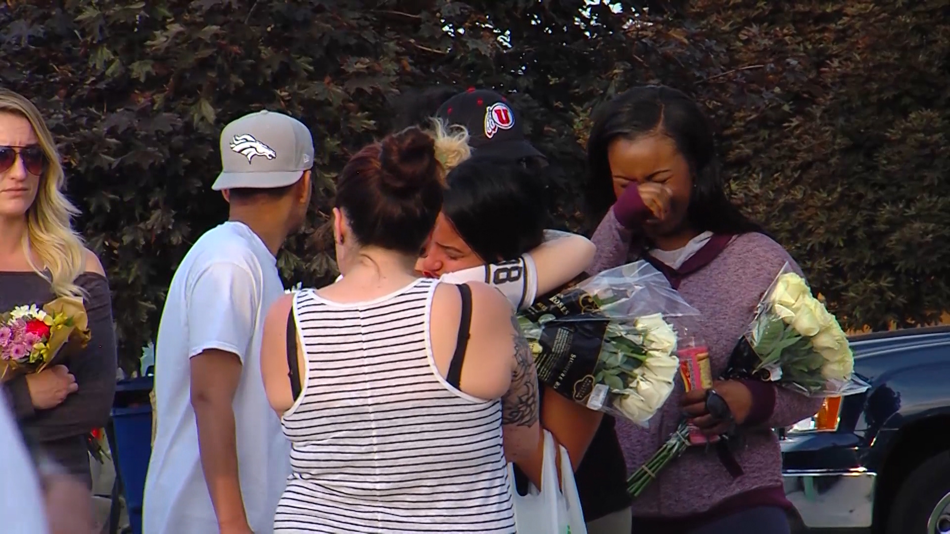 At a vigil for Natalia Casagrande in front of her home Thursday night, more than 100 mourners lit candles and played music as friends and family consoled her husband. Police say 24-year-old Casagrande was killed in her home Tuesday, May 31, 2016. (Photo: Adam Sotelo, KSL-TV)