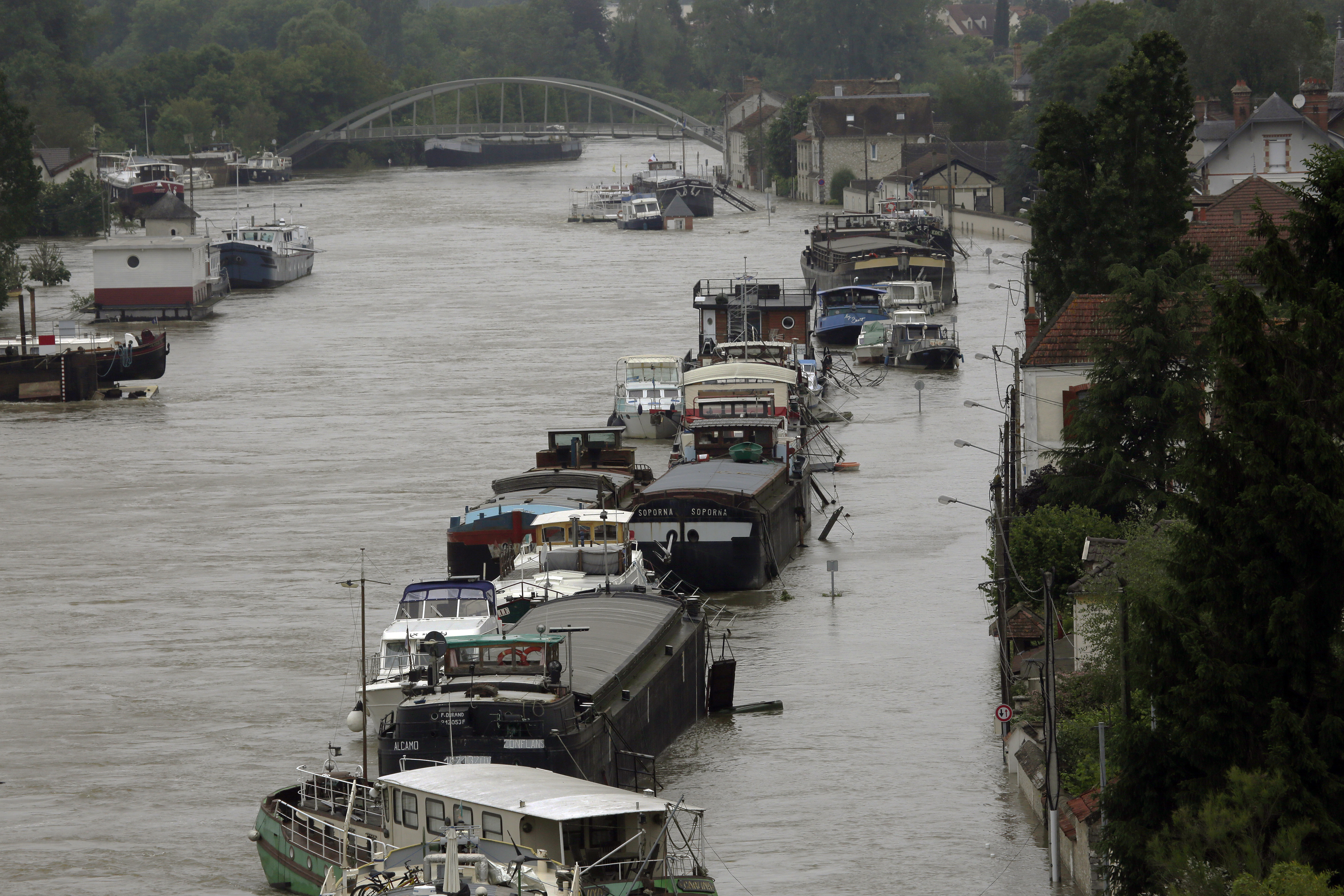 The Latest: French president: Paris floods are 'exceptional'