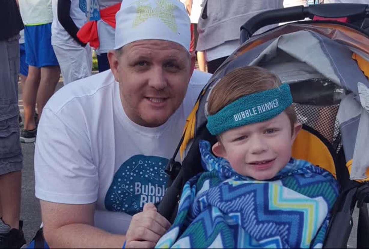 Alex Fox and his son. Photo: Brandon Whitworth/KSL-TV