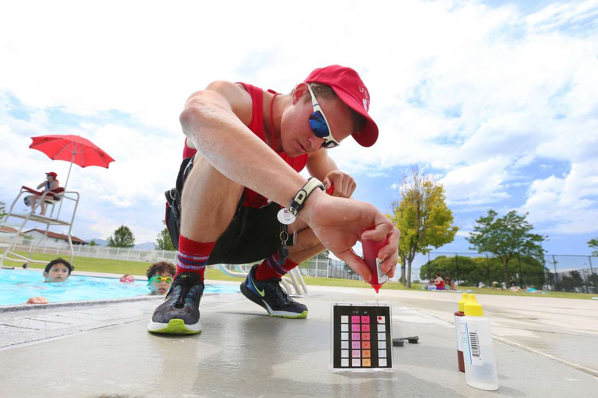 Head lifeguard Anthony Hovey conducts a water test at the West Valley City Centennial Swimming Pool on Tuesday, June 7, 2016. Salt Lake County Health Department officials said local pools are healthier than the national average and reminded residents that they are key in the fight for a healthy swimming season. (Photo: Scott G Winterton, Deseret News)