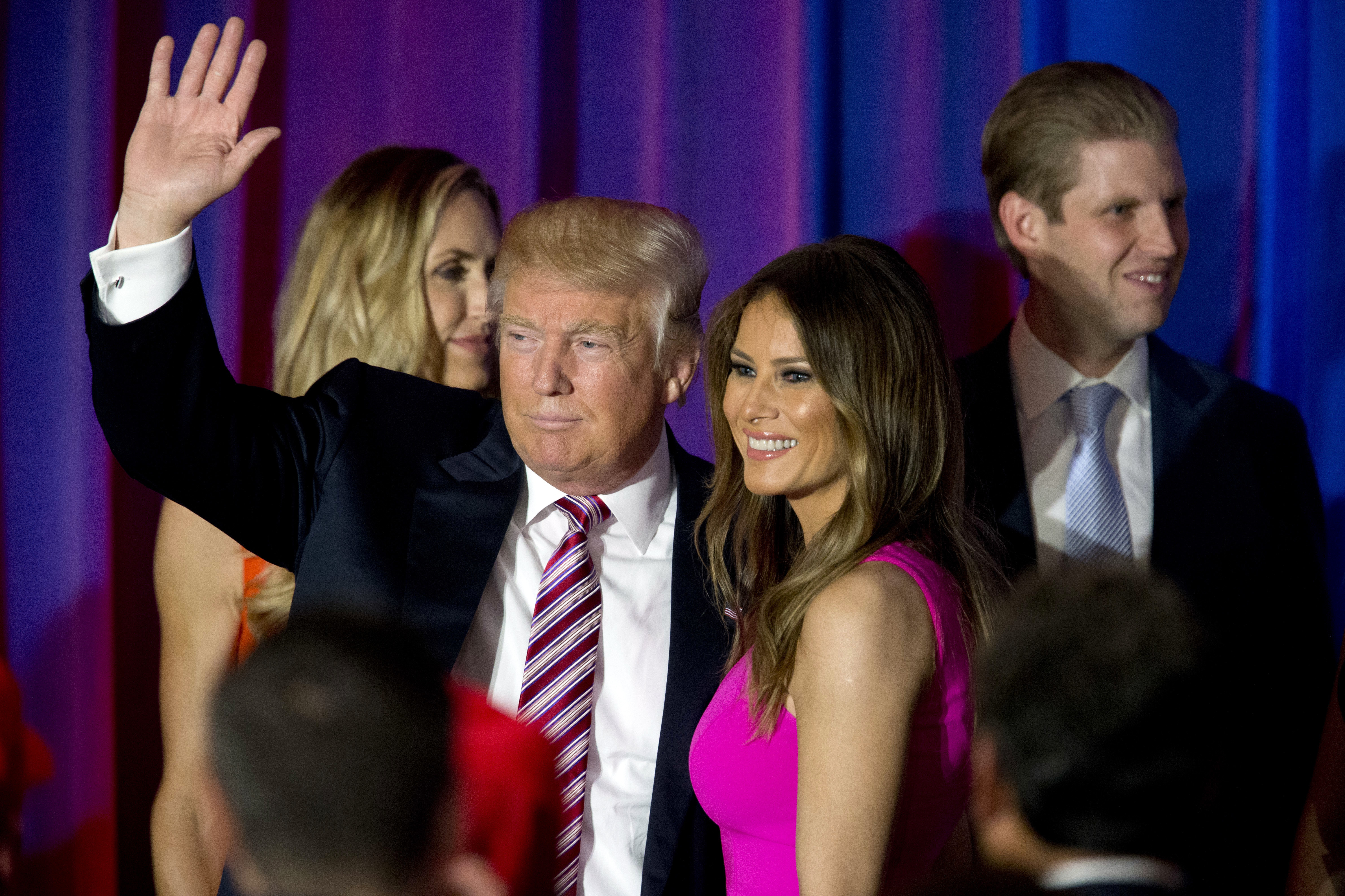 Republican presidential candidate Donald Trump waves at supporters as he leaves the stage with his wife Melania after a news conference at the Trump National Golf Club Westchester, Tuesday, June 7, 2016, in Briarcliff Manor, N.Y. (Photo: AP Photo)